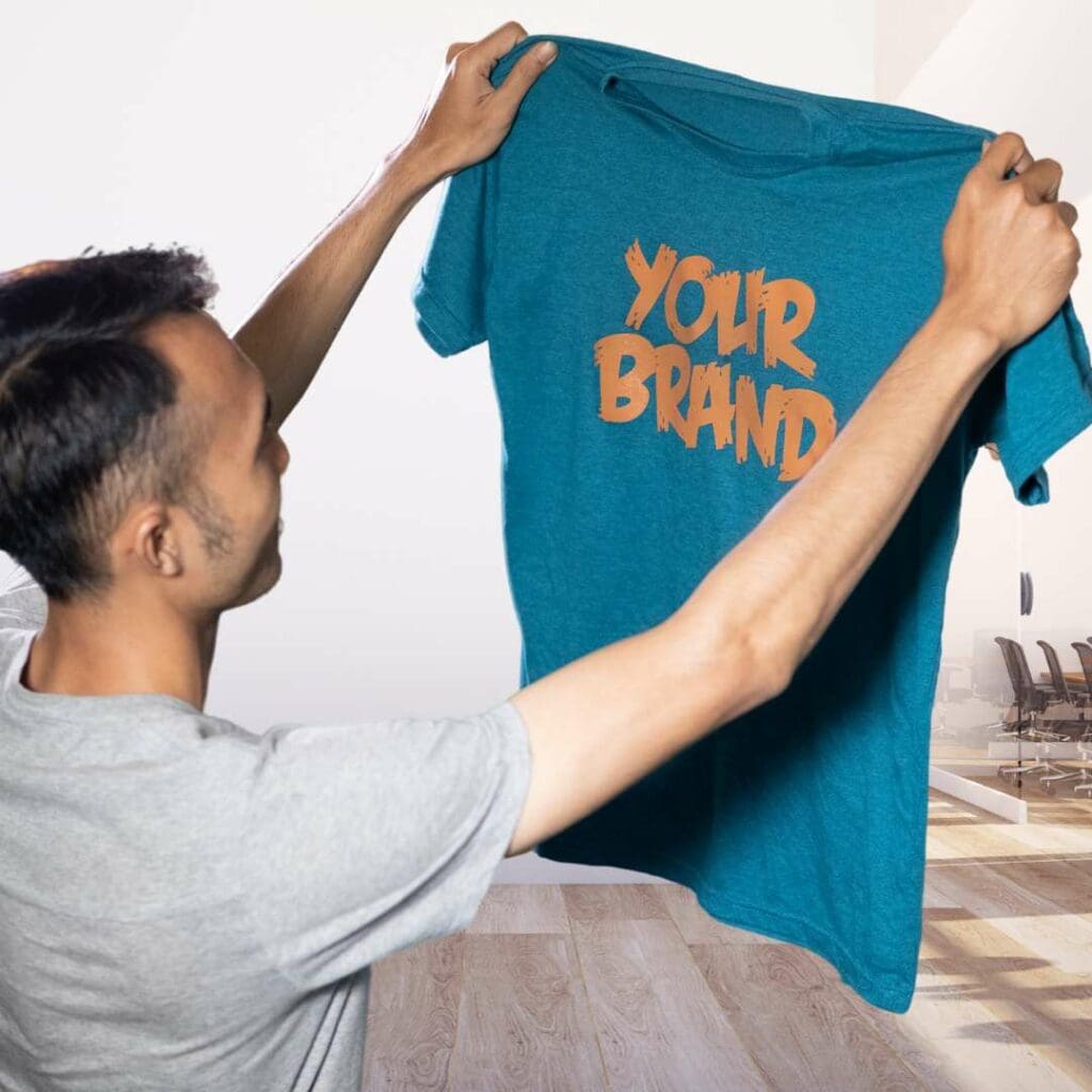 Screen Printing result of a tshirt in Ottawa being held by someone